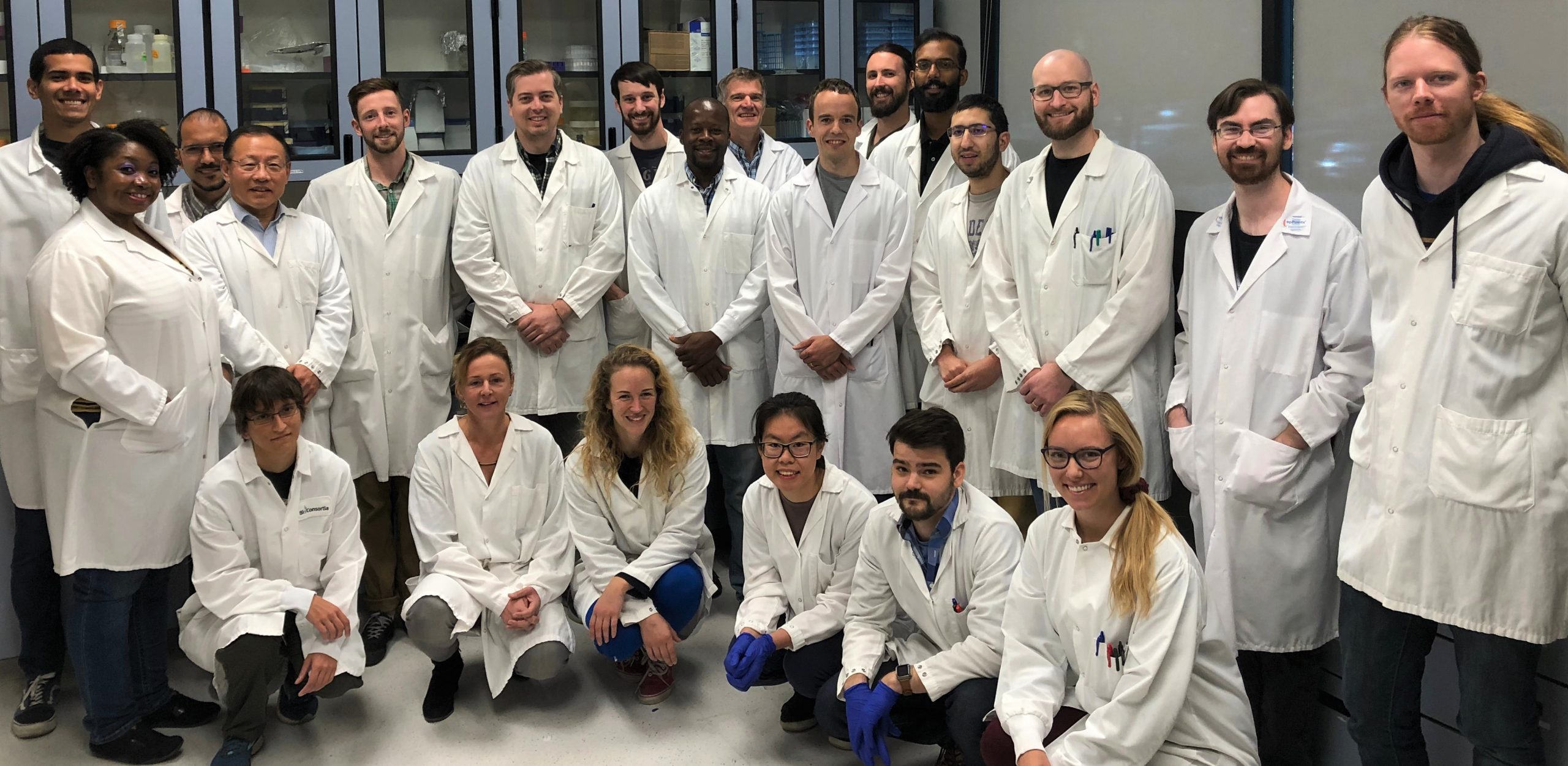 Group photo of Bioconsortia employees in the lab
